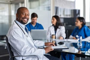 Feature image of clinical staff in an office